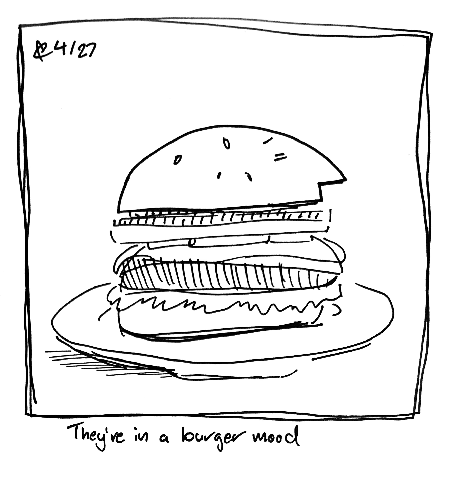 The Wide One rests on top of a burger. They're the top bun! The caption reads "They're in a burger mood"